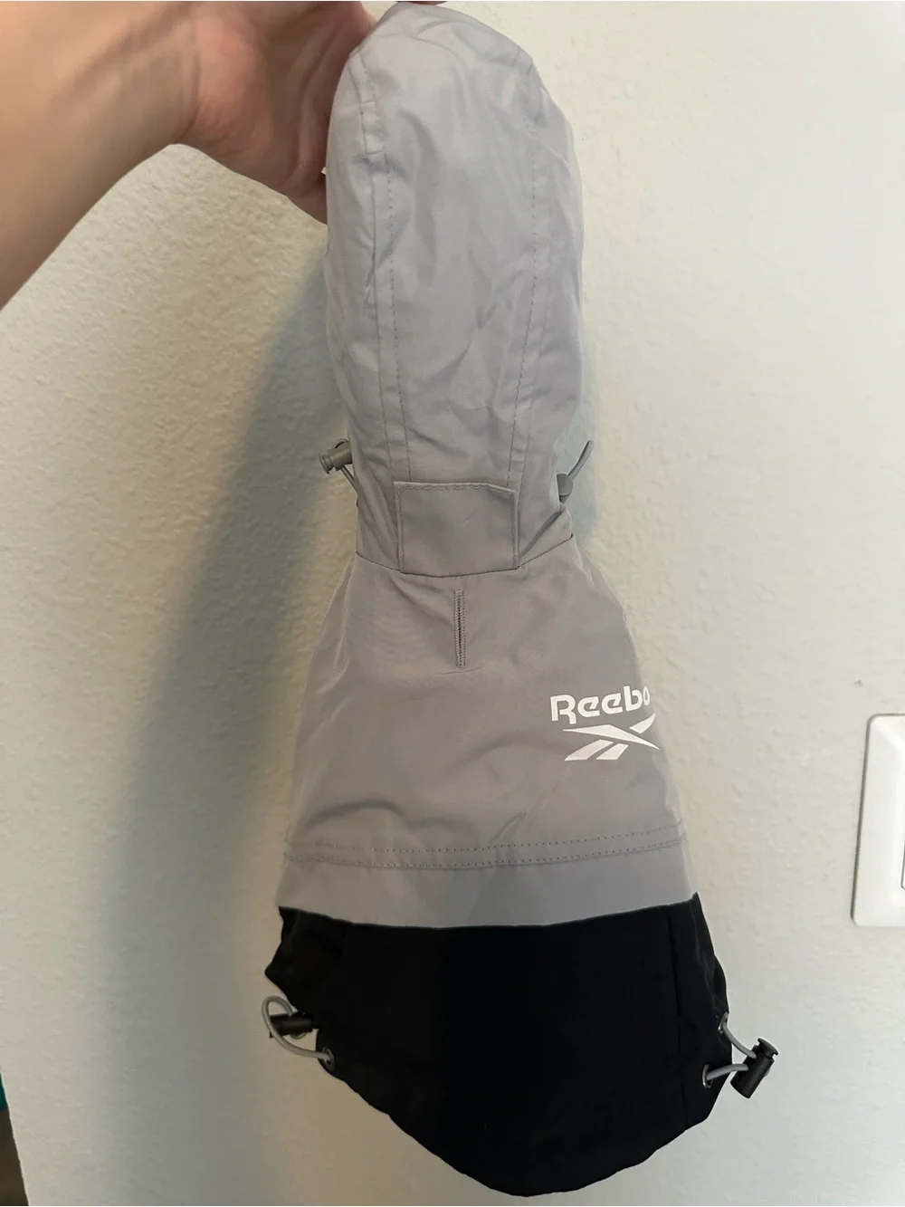 Reebok dog’s Gray and Black rain Jacket